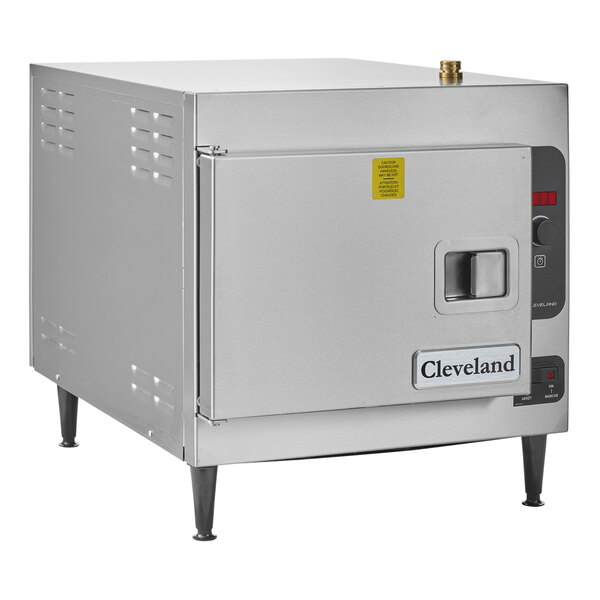 A stainless steel Cleveland countertop steamer with a door open.