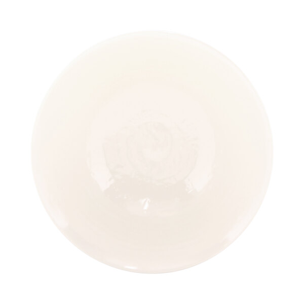 An Elite Global Solutions round melamine bowl with a white interior and chocolate rim.