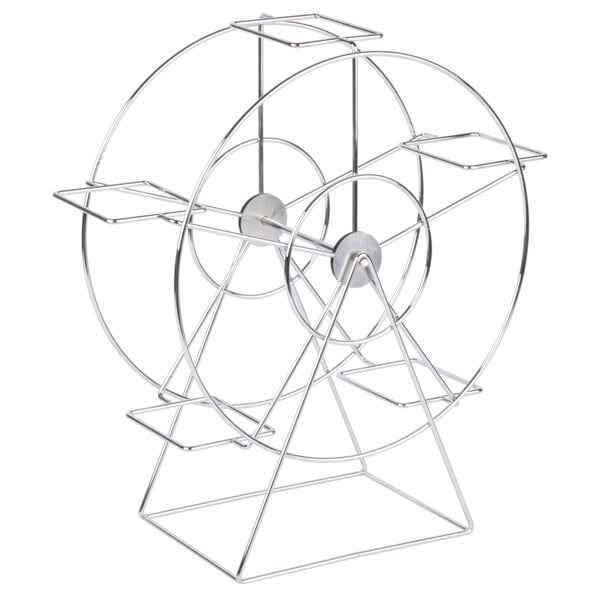 A metal ferris wheel with multiple shelves and a wire frame with four wheels.