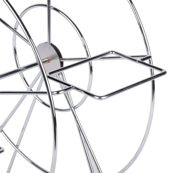 A chrome metal Clipper Mill Ferris Wheel rack with 5 baskets.
