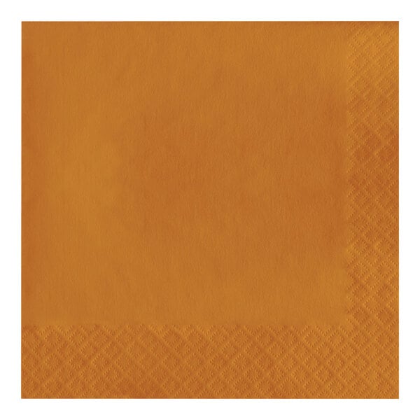 A close up of a Creative Converting Pumpkin Spice orange paper napkin with a square design.
