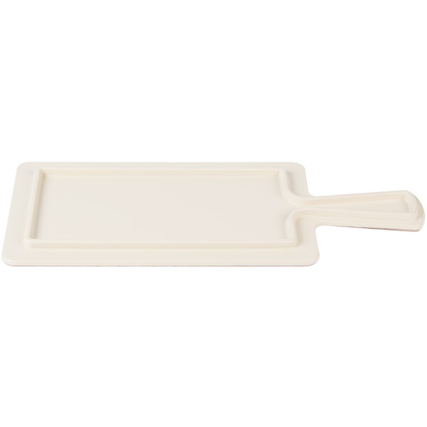 A rectangular faux driftwood serving board with a white border and a handle.