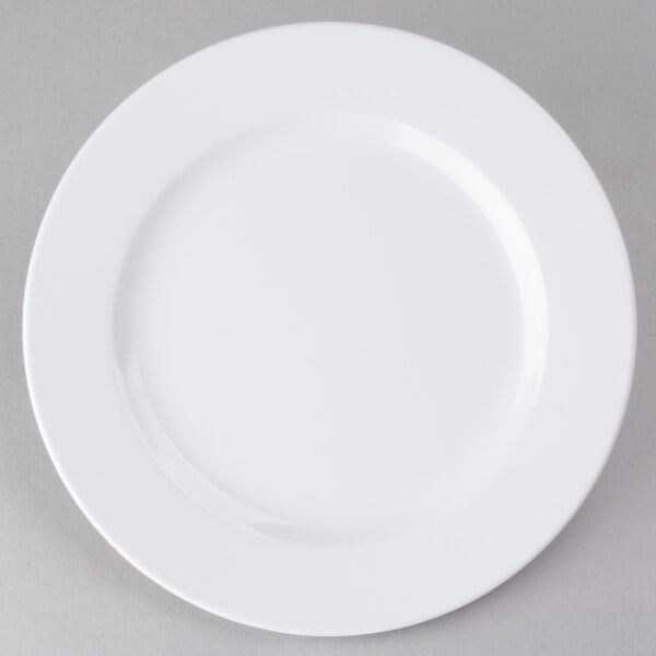 A white Elite Global Solutions melamine plate with a white rim on a gray background.