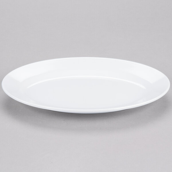A white Elite Global Solutions oval melamine plate with a rim.