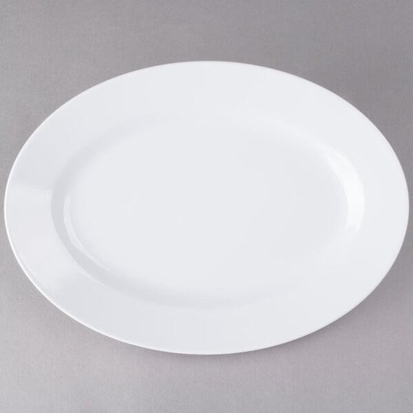 A white Elite Global Solutions oval melamine plate.