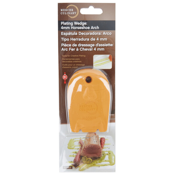 A Mercer Culinary horseshoe arch plating tool in a package.