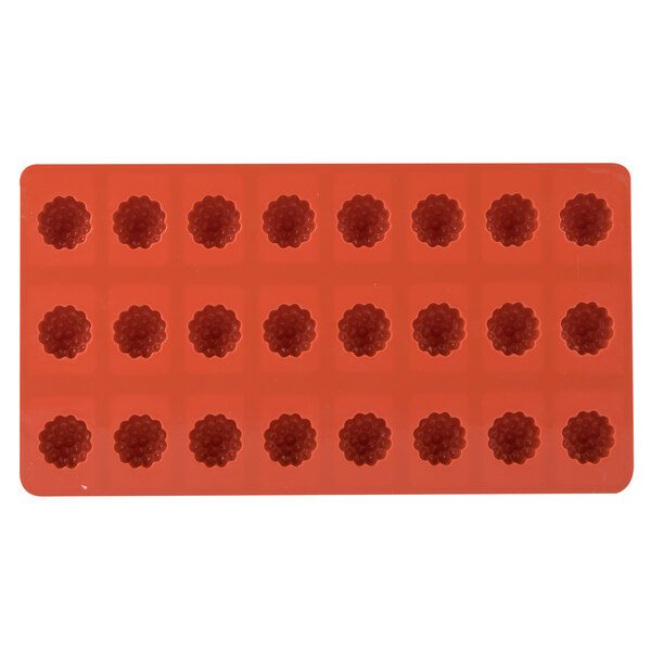 A red silicone Martellato mold with 24 round compartments.