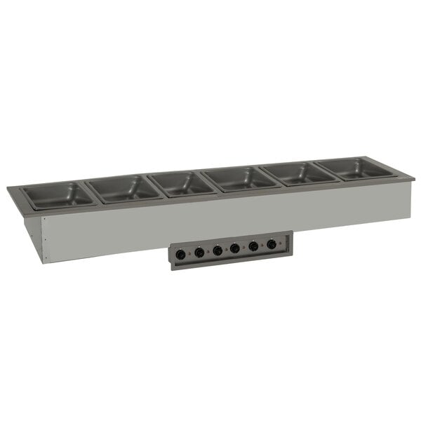 A Delfield drop-in hot food well with six compartments.