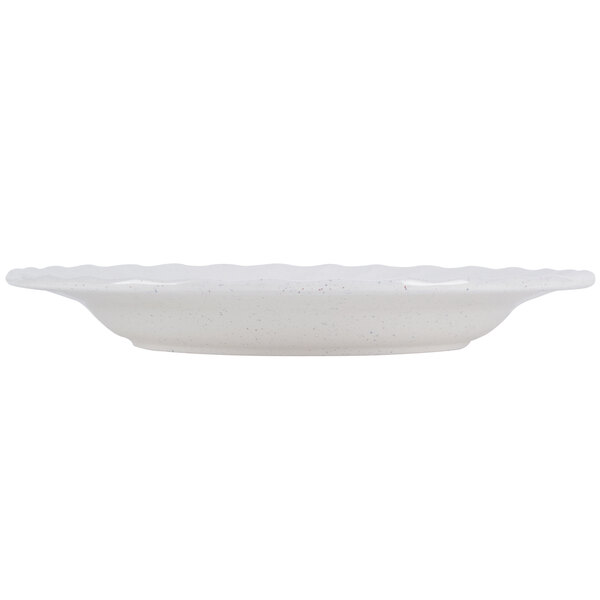 A white Thunder Group Blue Bamboo melamine plate with a scalloped edge.