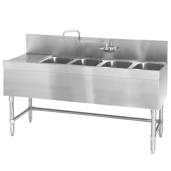 A Eagle Group stainless steel underbar sink with four bowls and a left drainboard.