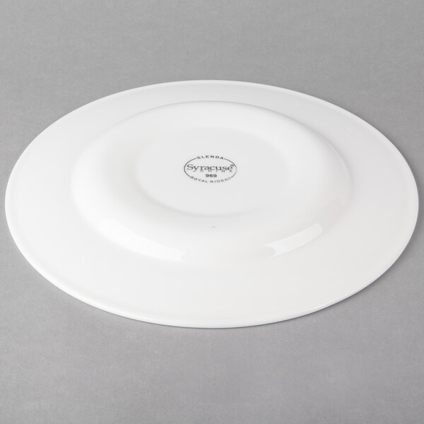 A white Libbey Slenda porcelain plate with a circular design on the rim.