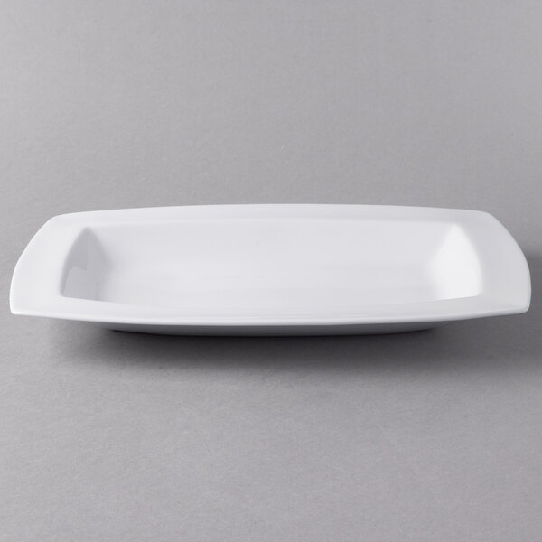 A white rectangular Libbey porcelain bowl on a gray background.