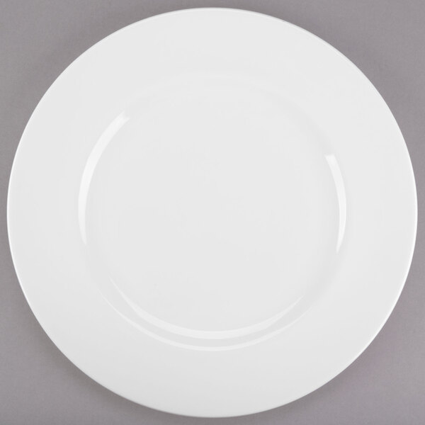 A white Libbey porcelain plate with a wide white rim.