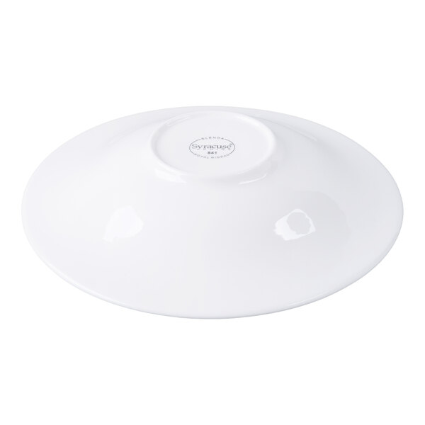 A white, round porcelain bowl shown upside down on a white background.