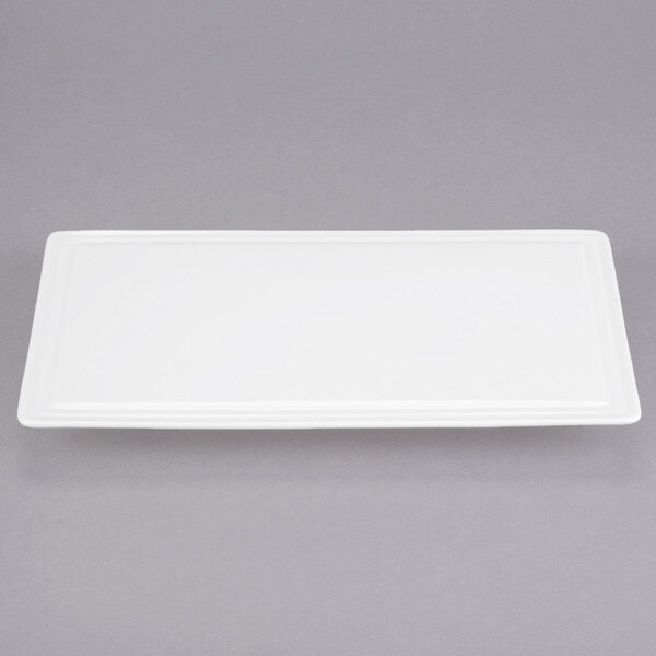 A white rectangular tray with a black border.