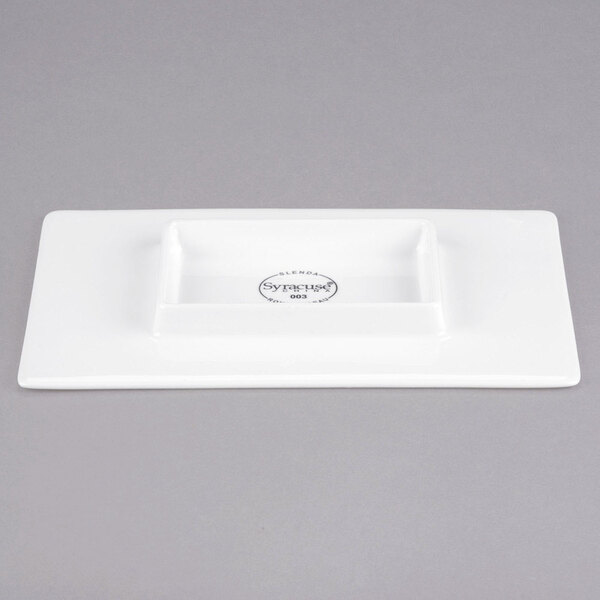 A white rectangular Libbey porcelain tray with a rectangular center.