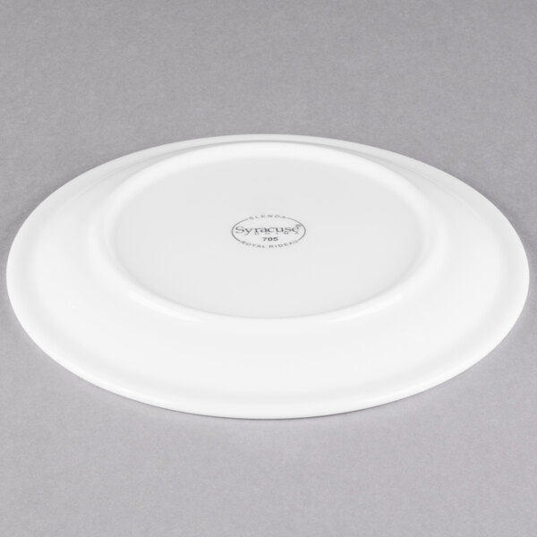 A Libbey white porcelain plate with a circular design on the rim.