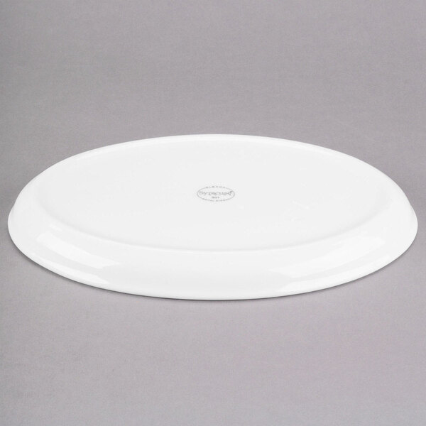 A white Libbey porcelain tray with a logo on it.