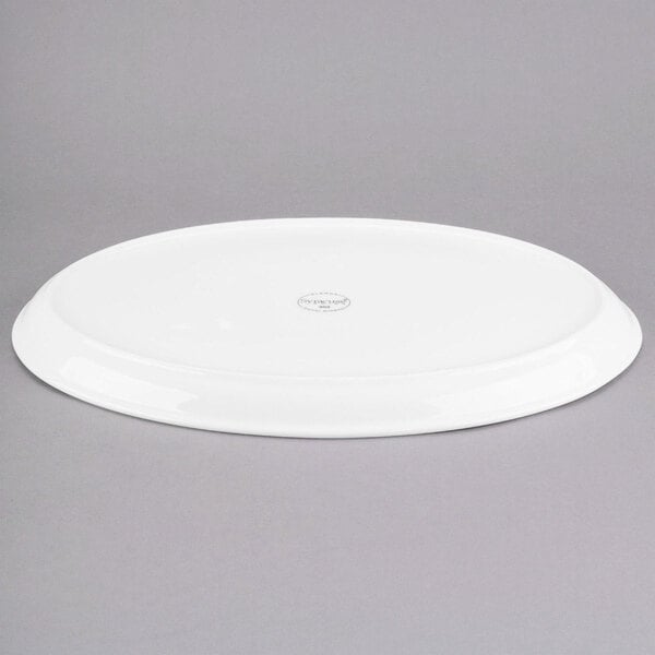 A white Libbey porcelain tray with a logo.