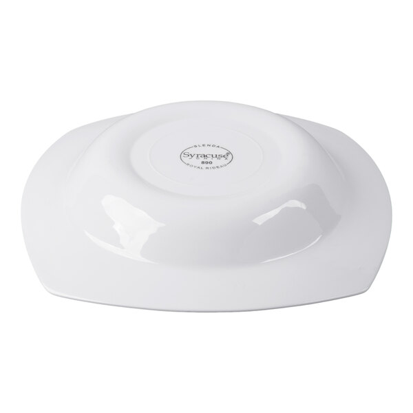 A white square porcelain deep rimmed soup bowl shown upside down.