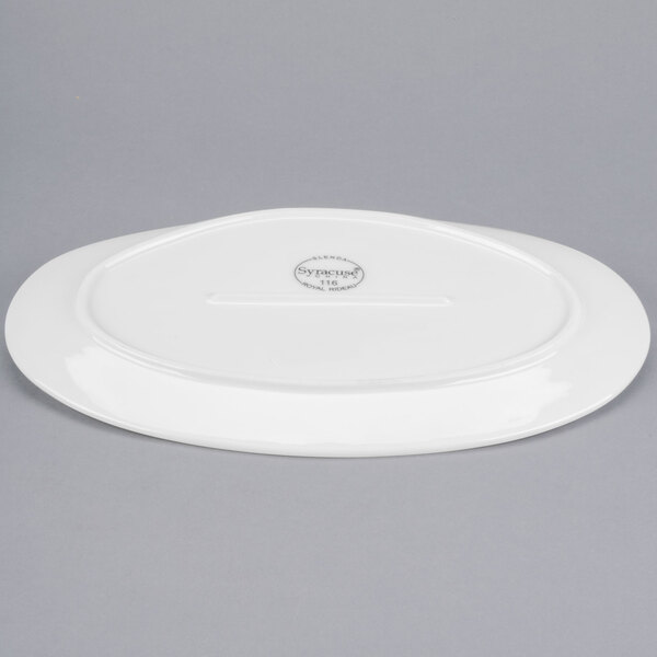 A white Libbey porcelain oval plate.