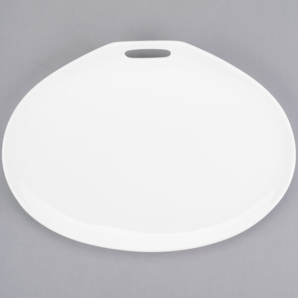 A white oval Libbey porcelain plate with two handles.