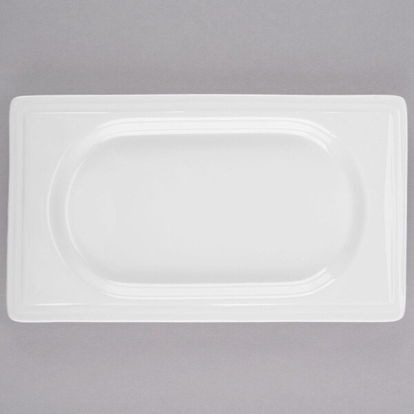 A white rectangular Libbey porcelain tray with a white border.