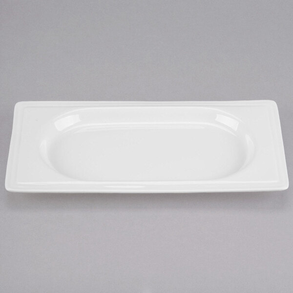 A white rectangular Libbey porcelain tray with a white border.