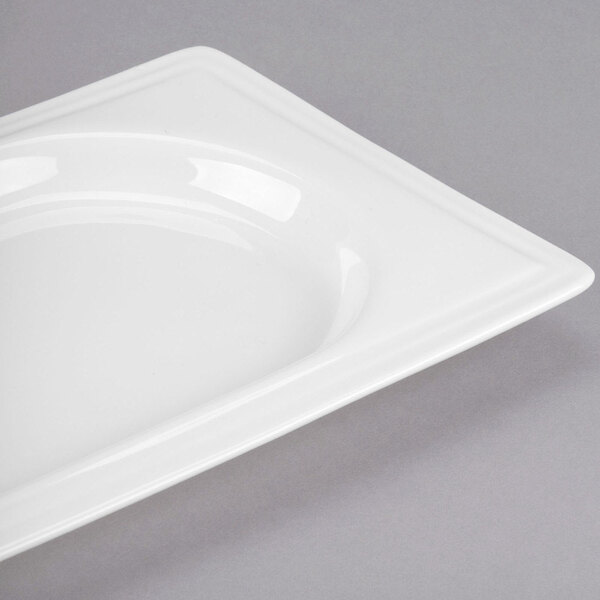 A white rectangular porcelain tray with a square edge.