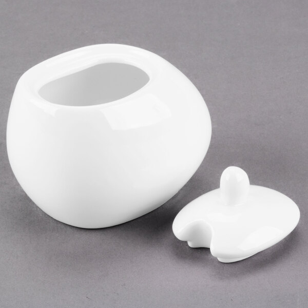 A white ceramic Libbey sugar pot with a lid.