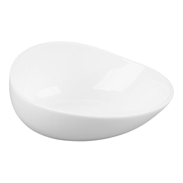 A white, asymmetrical porcelain bowl with smooth, rounded edges.