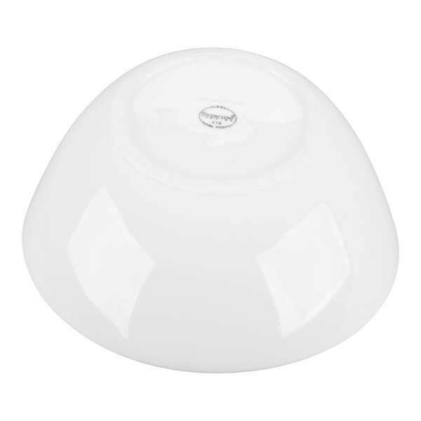 A white, round bowl shown upside down on a plain background.