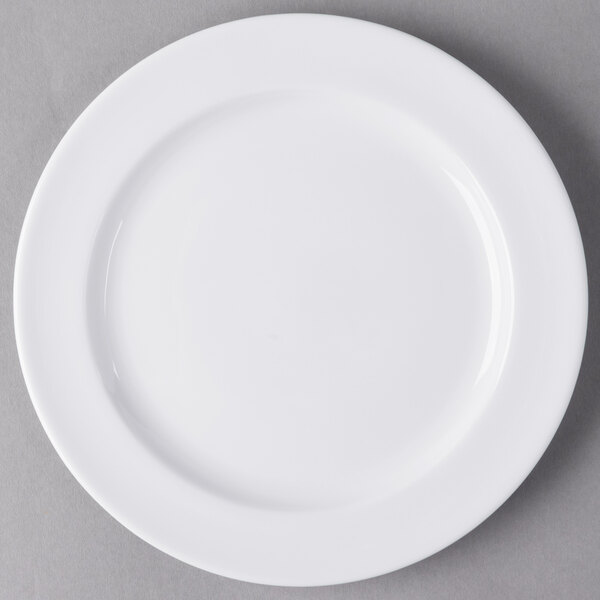 A Libbey round white porcelain plate with a white rim.