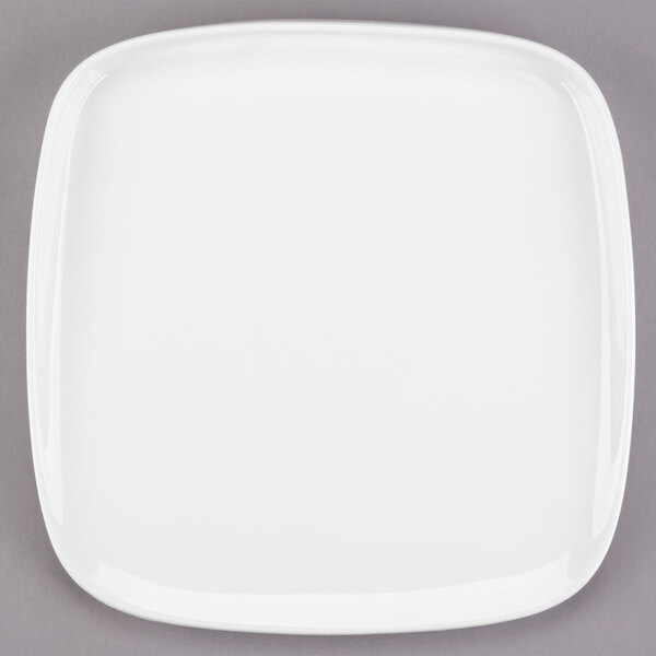 A white square Libbey porcelain plate with a white rim.