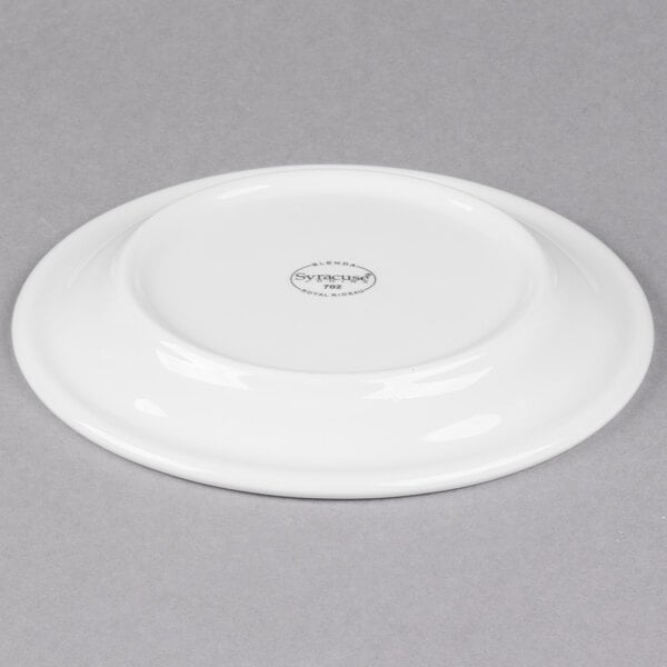 A white Libbey porcelain plate with a circular rim.