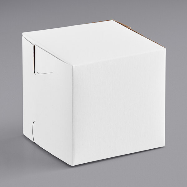A white box with a brown lid.