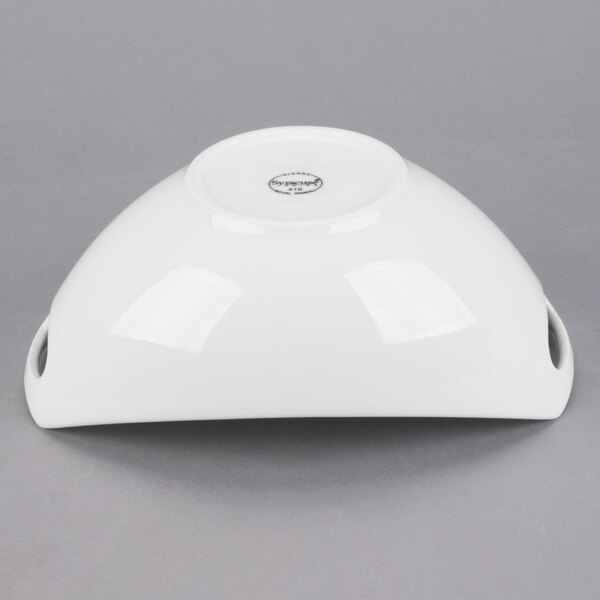 A white Libbey porcelain bowl with handles.