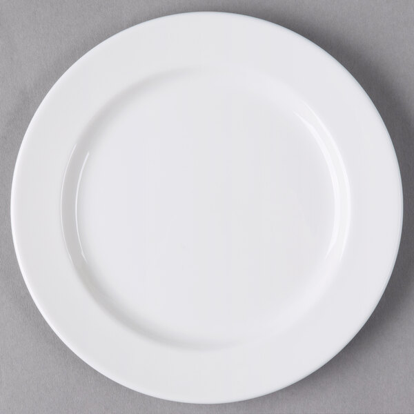 A Libbey round white porcelain plate with a white rim.