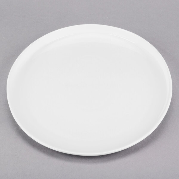 A Libbey white porcelain platter with a rim.