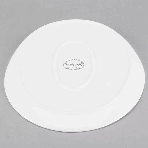 A white Libbey porcelain platter with an oval design.