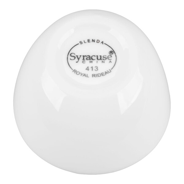 A white, round-bottomed porcelain bowl with the brand name and product details printed on the base.
