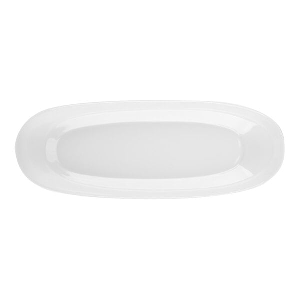 A white, oval-shaped porcelain plate with a smooth, glossy finish, viewed from above.