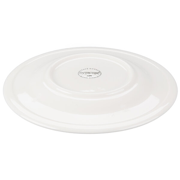 A white porcelain plate with a medium rim.