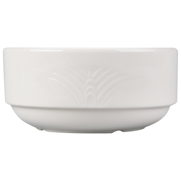 A close-up of a white Reserve by Libbey Royal Rideau porcelain bouillon bowl with curved lines.