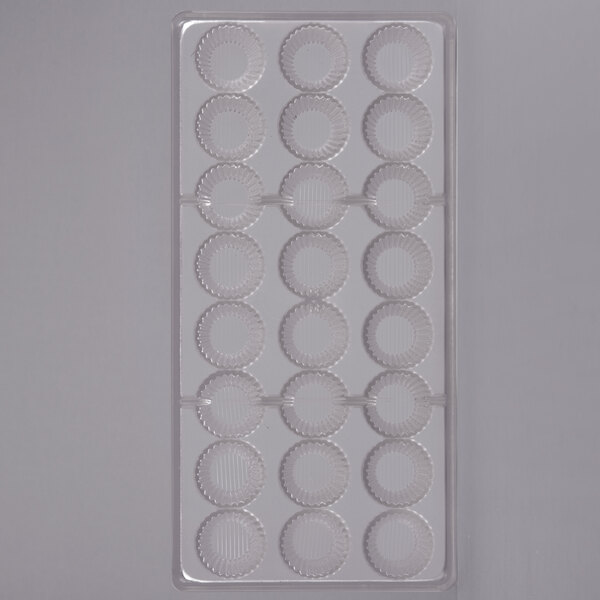 A white plastic tray with 24 circular compartments.