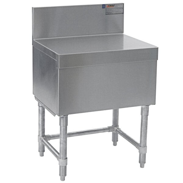 A stainless steel Eagle Group Spec-Bar filler board on a counter.