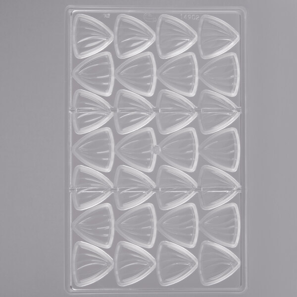 A clear plastic tray with triangular shapes.