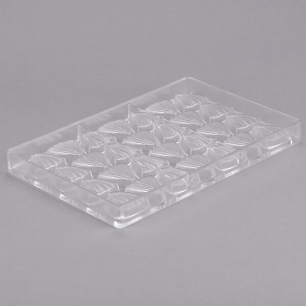 A clear plastic tray with a pattern of striped triangles.