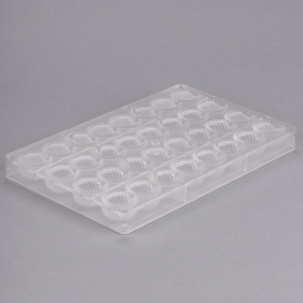 A clear polycarbonate tray with 32 rose-shaped compartments.