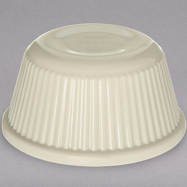 A white Carlisle fluted melamine ramekin with a lid on top.
